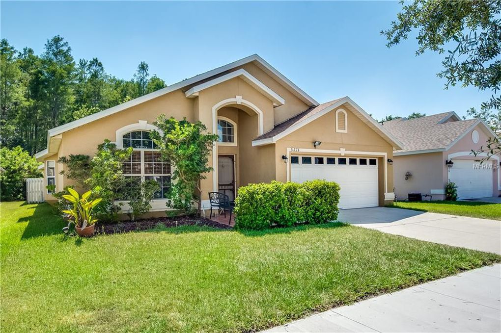 Maison à vendre à Orlando, 4 chambres Realty Luxe Maison à vendre à Orlando, 4 chambres Realty Luxe